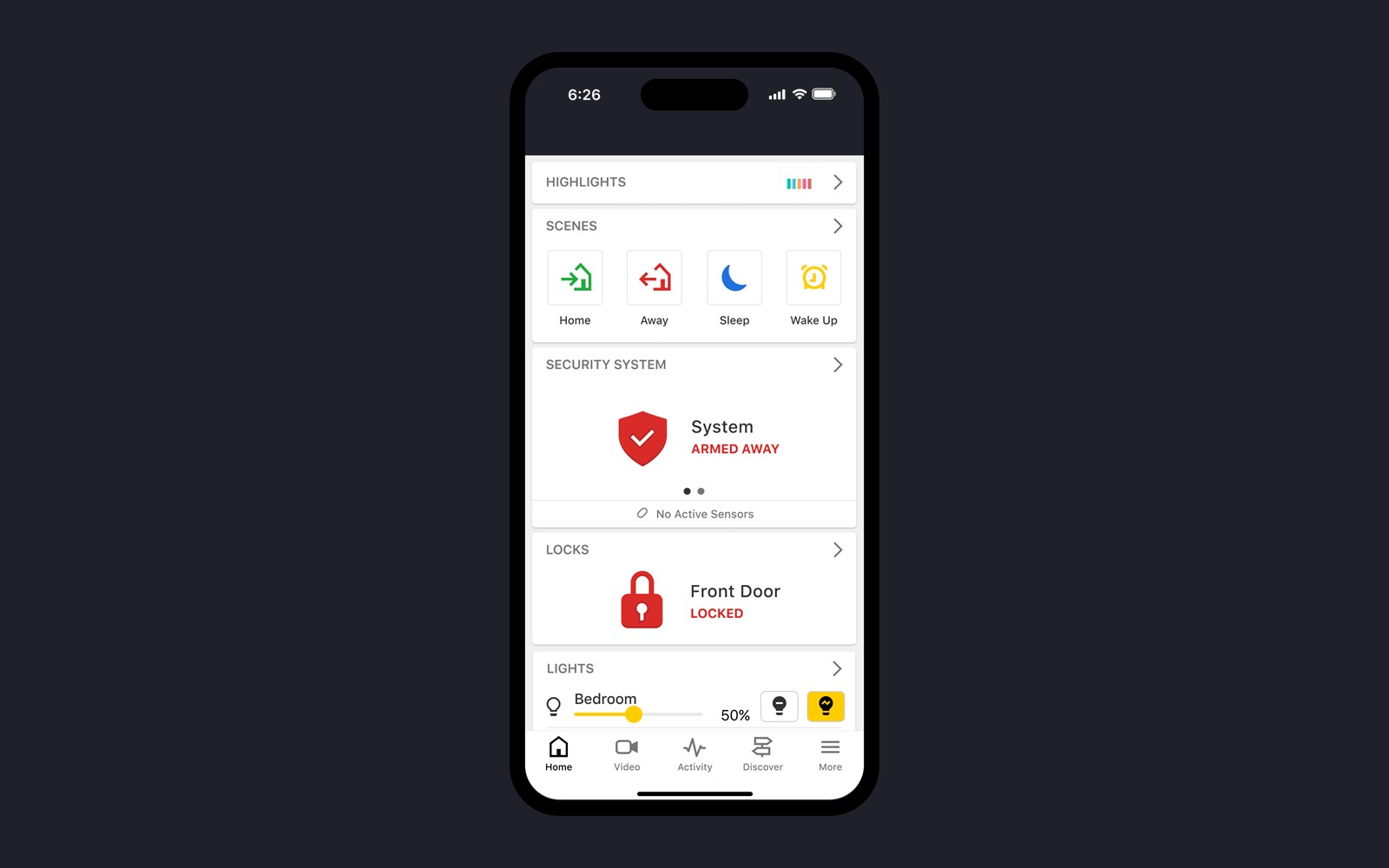 Alarm.com app showing the security system armed away, the front door locked and bedroom lights dimmed